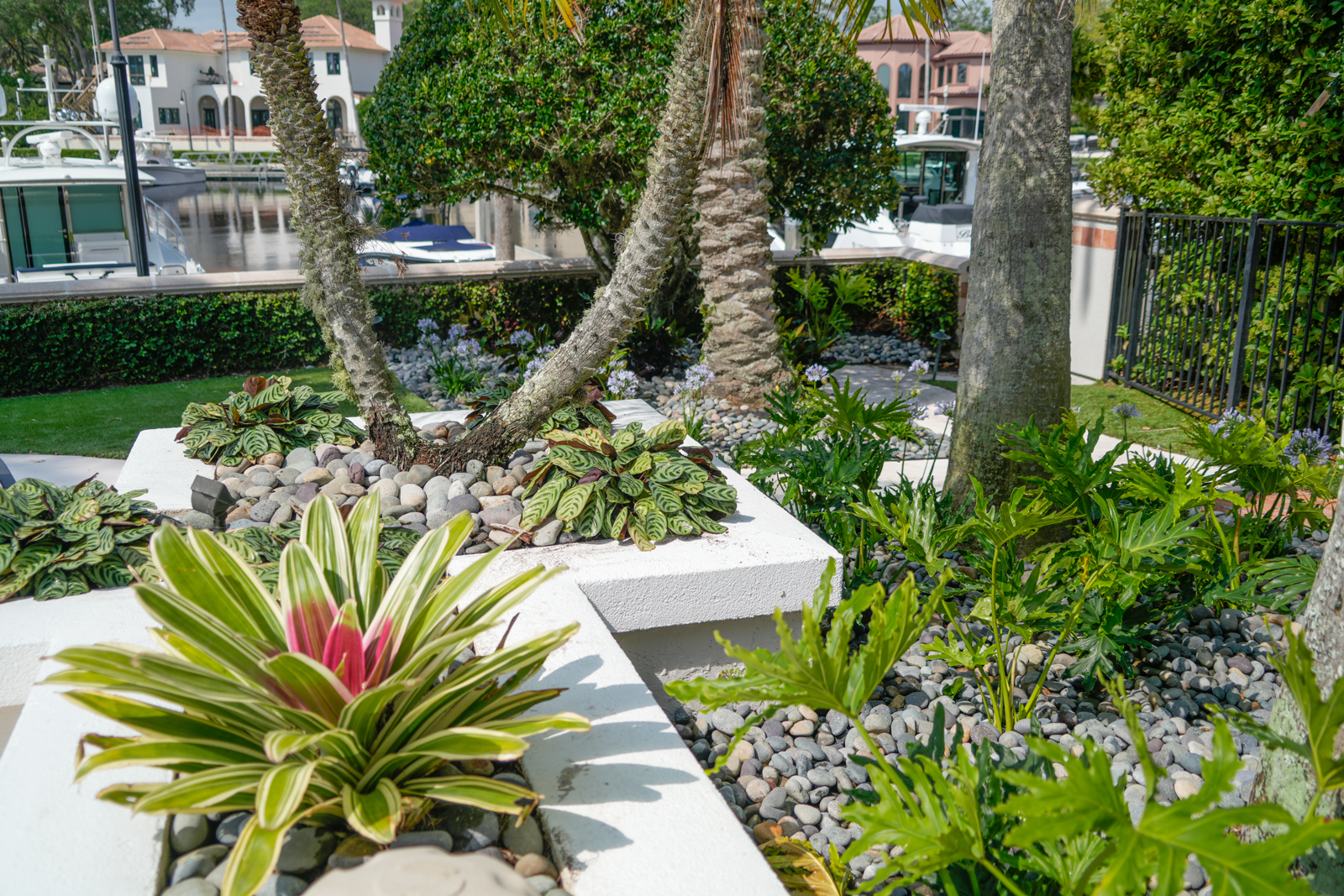 Elegant hardscape design featuring stone walkways, patios, and edging, crafted by Coconut Grove Landscape & Design to enhance outdoor living spaces