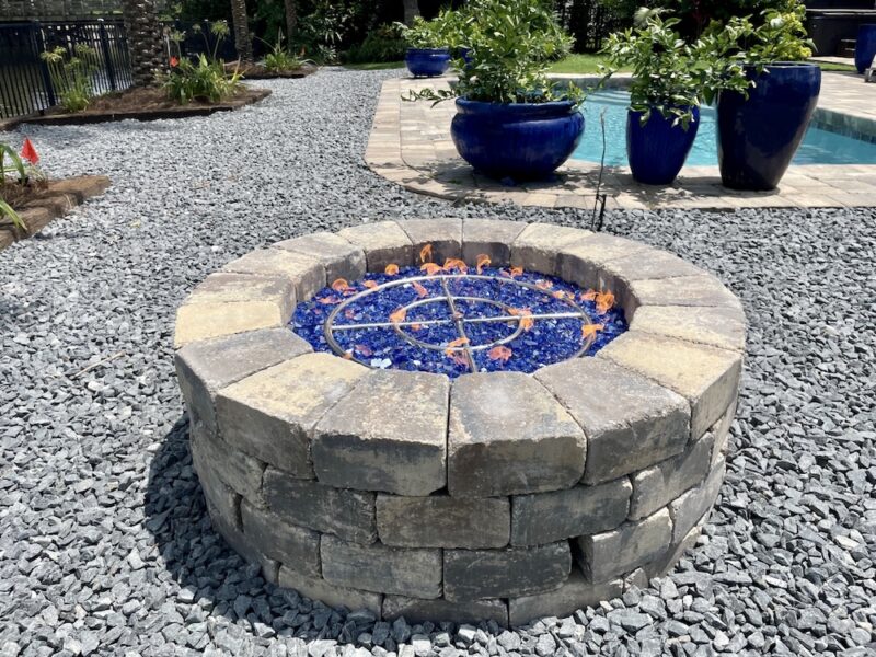 Ideas for transforming landscapes with hardscape features like outdoor kitchens and fire pits