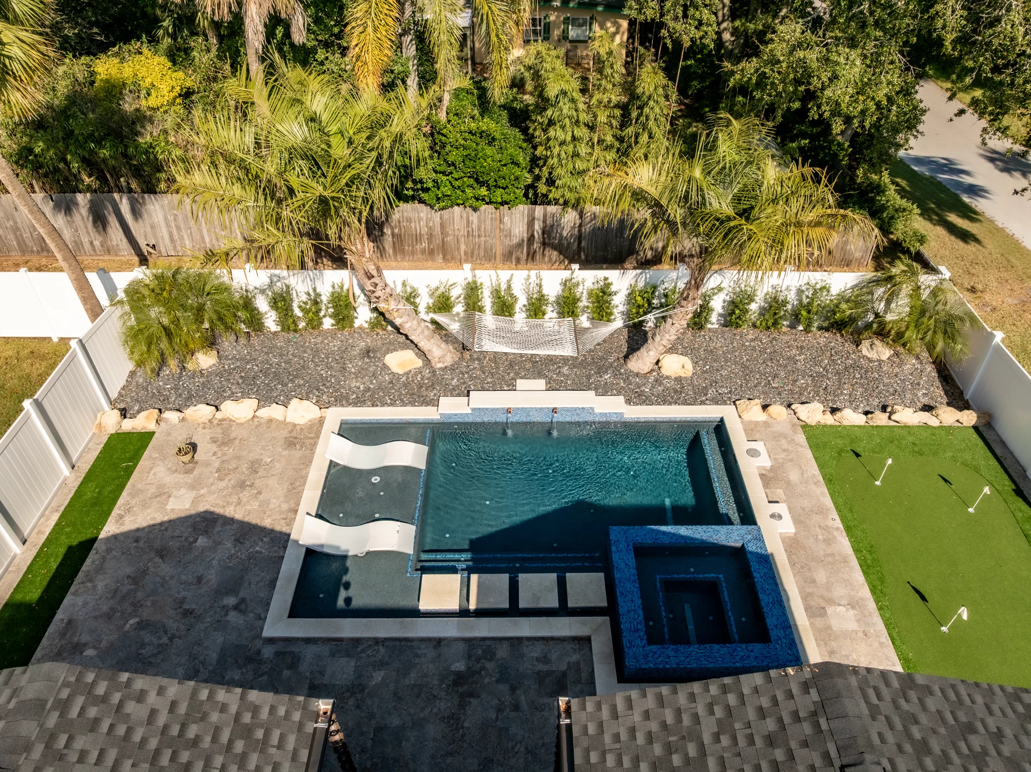 Poolside Cabana Retreat Poolside cabana landscape design in Jacksonville Beach near the Atlantic Coastline