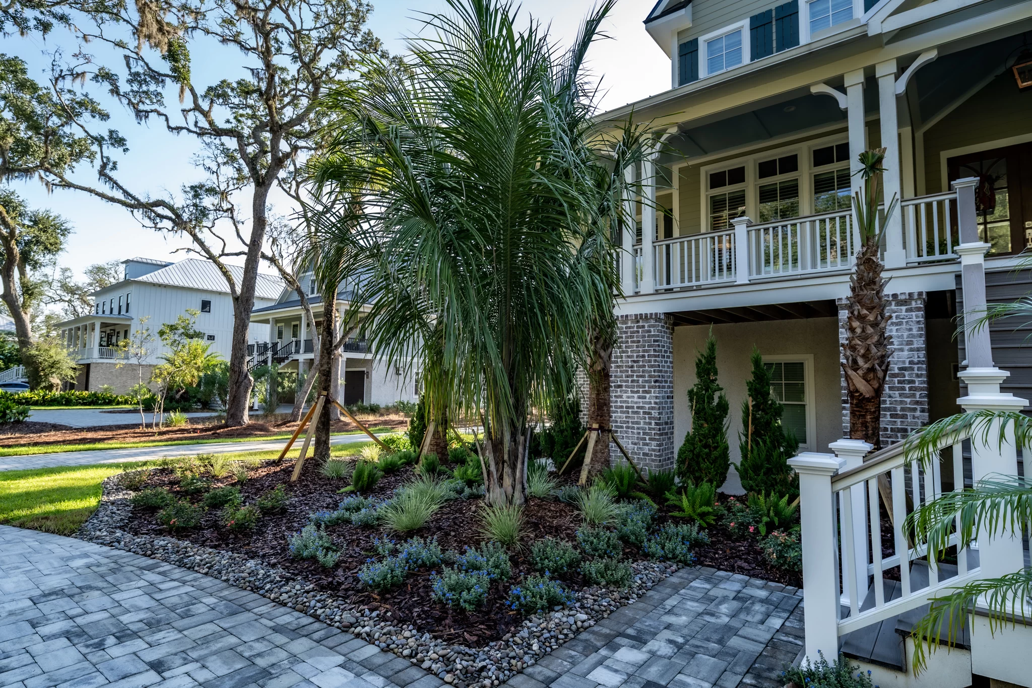 Southern Georgia Landscape Luxury landscape design in St. Mary’s Georgia with palms, patios, and coastal greenery