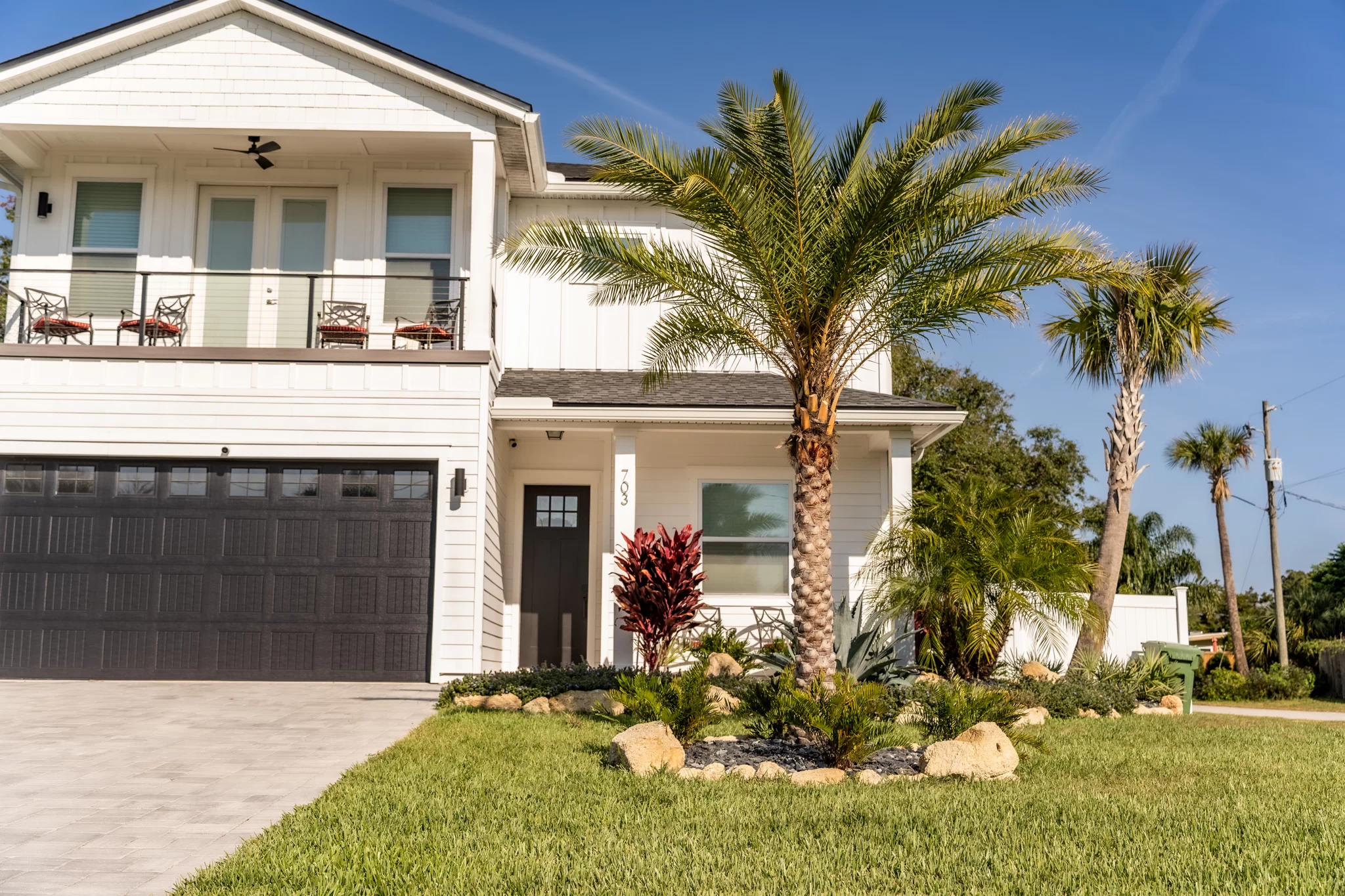 Atlantic Coast Yard Coastal landscape design in Jacksonville Beach with Zoysia grass and luxury outdoor living