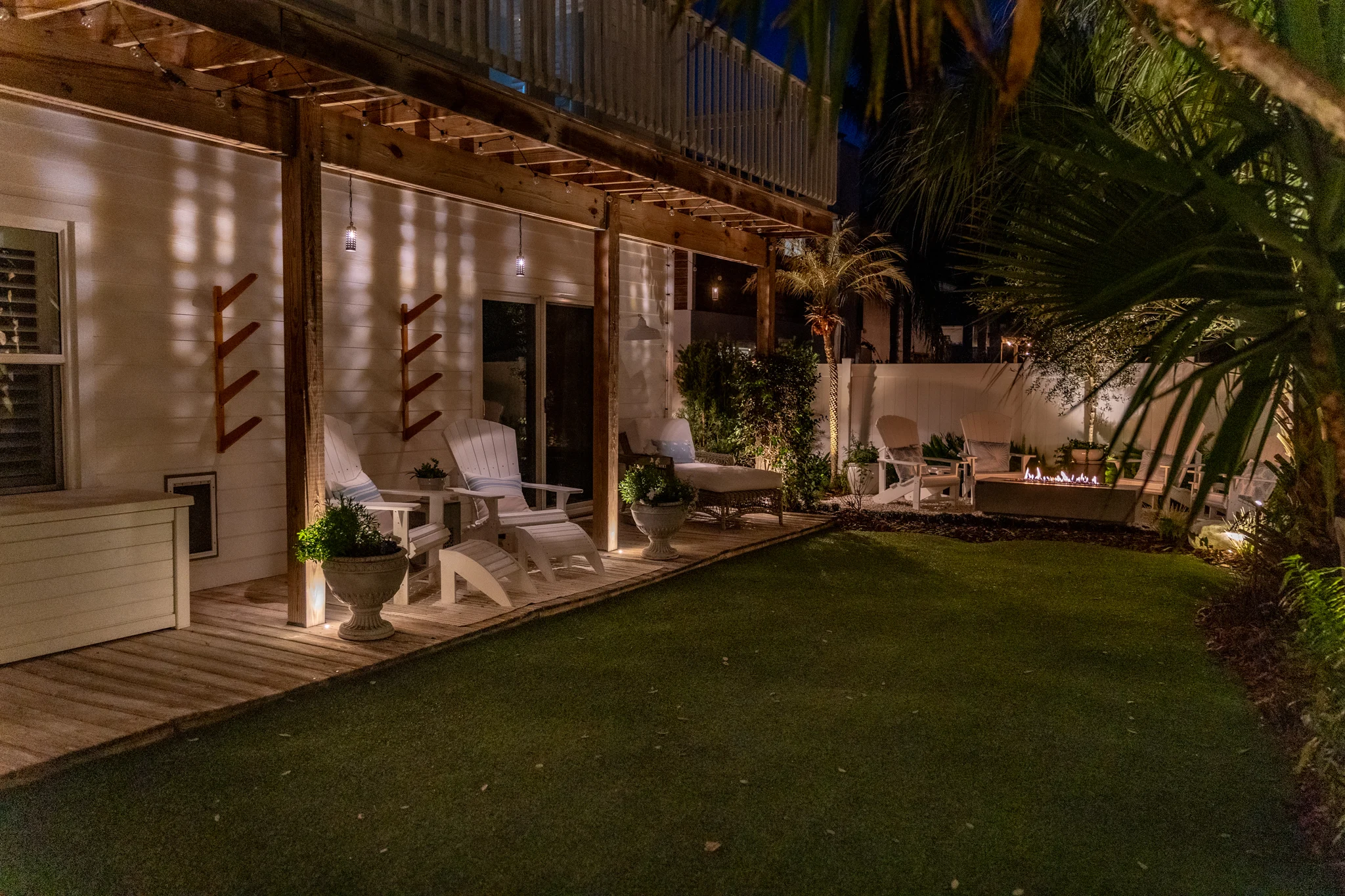 Backyard Game Zone Backyard game zone in Atlantic Beach with patio design, greenery, and relaxation areas