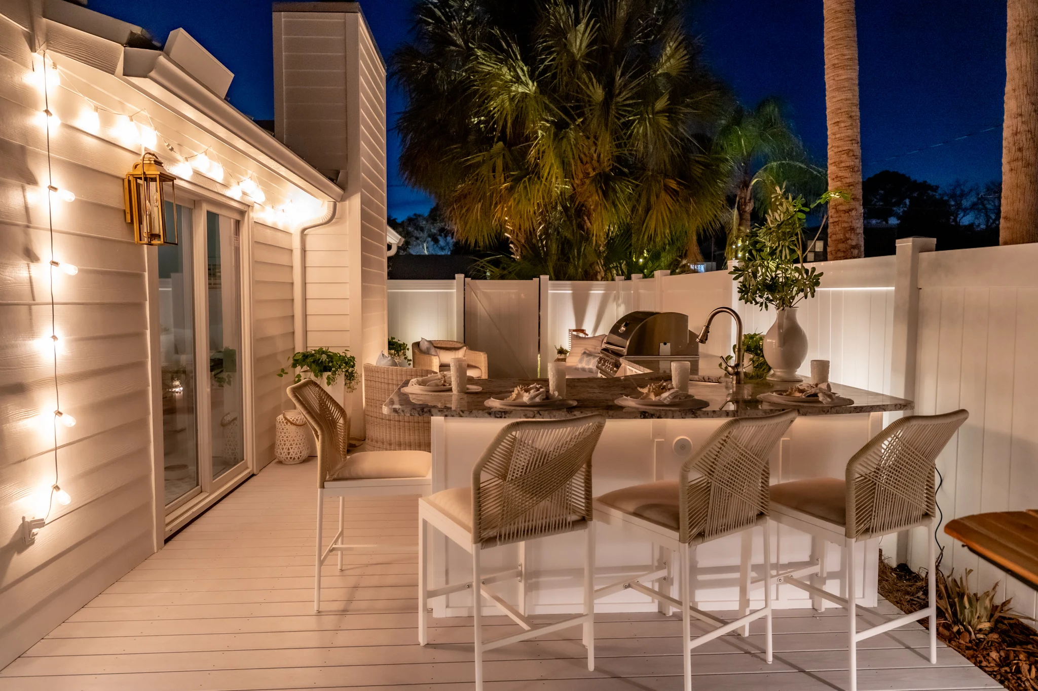 Fire Lounge Retreat Sunken fire lounge in Atlantic Beach with stone seating and luxury outdoor entertainment space