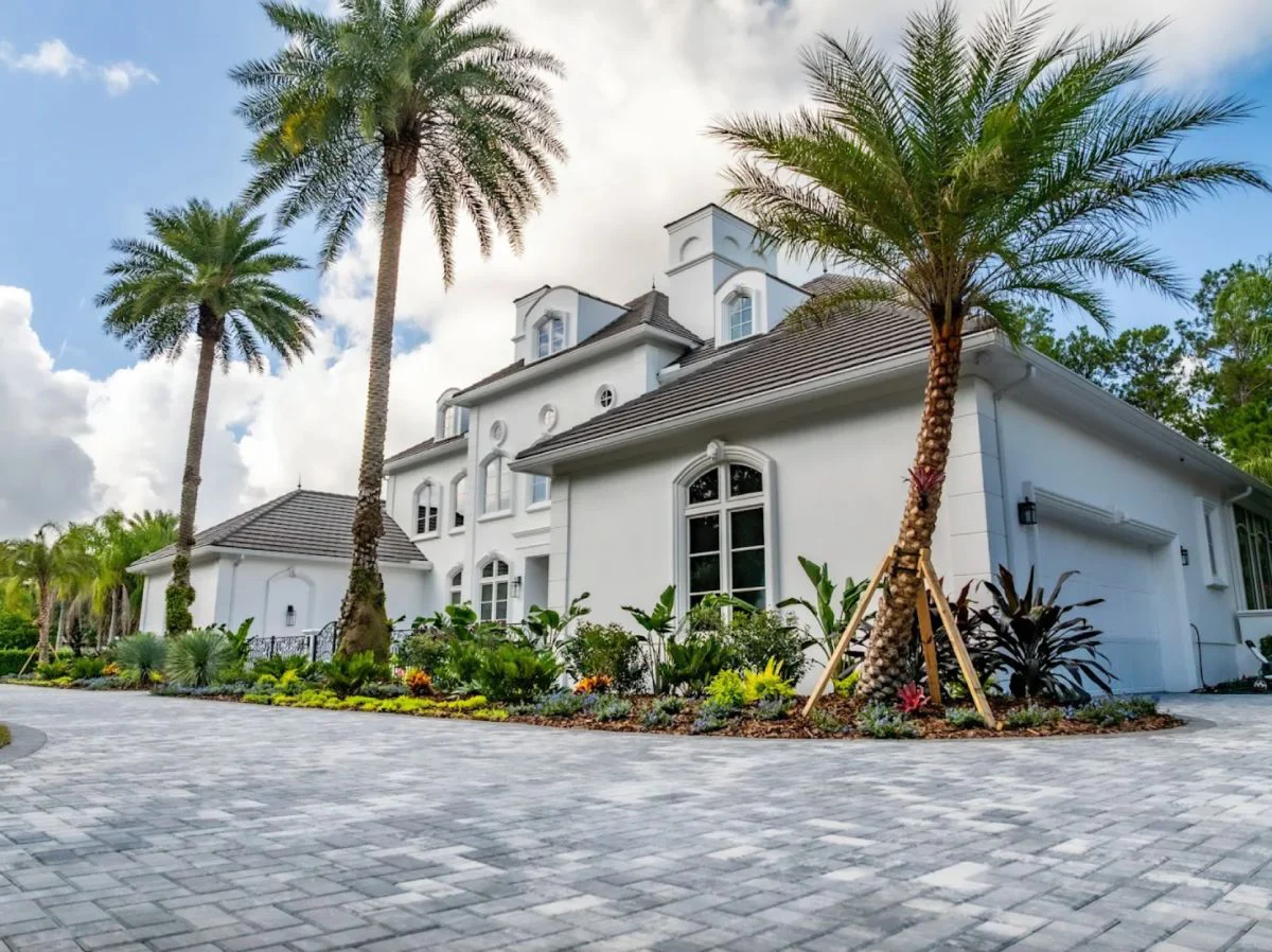 Lets build something beautiful (1) Hardscape company installing a custom paver patio for a luxury Florida outdoor living space