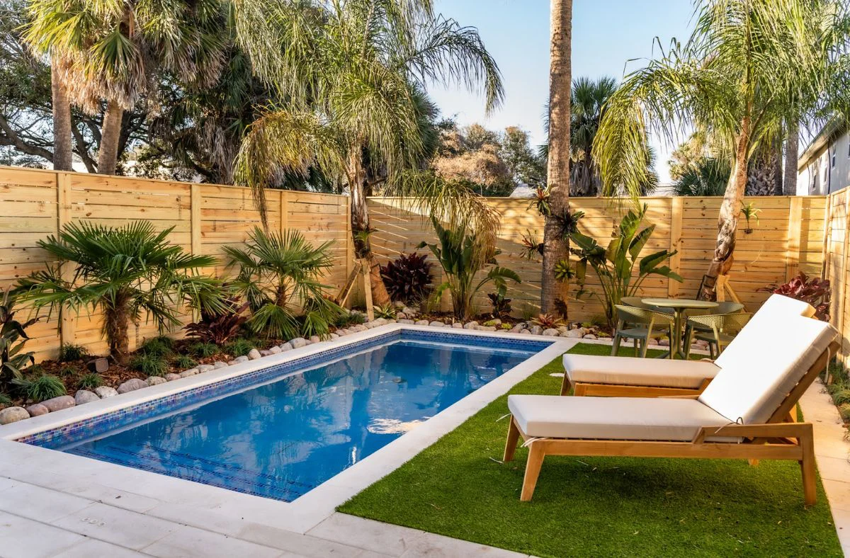 Built for Florida Living, this backyard is complete with a customized pool and turf